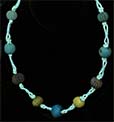Ancient Egyptian faience necklace with melon amulets